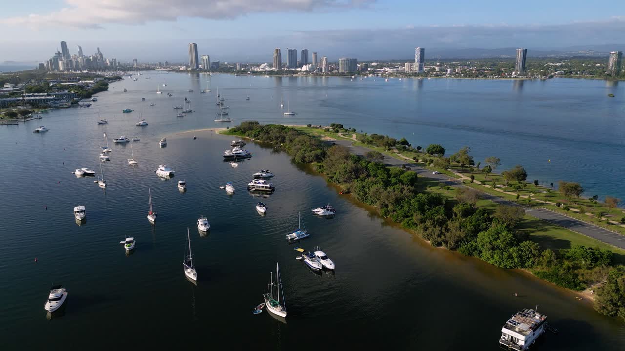 Reversing aerial View over Doug Jennings Park looking South towards Surfers Paradise, Gold Coast, Australia.