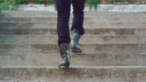 male legs going up stairs. man legs going upstairs. man climbing stairs