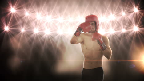 young man practising boxing