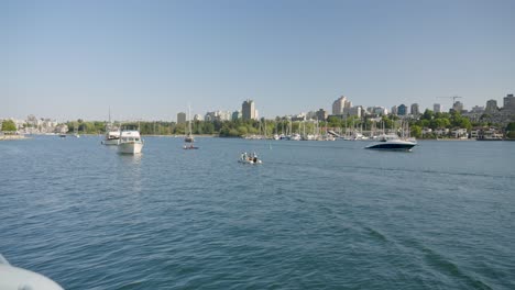 boats sailing along the vancouver waterfront