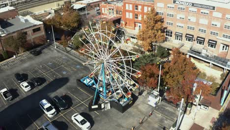 enjoy the thrill of bricktown ferris wheel in oklahoma city on a windy day, a dynamic urban adventure