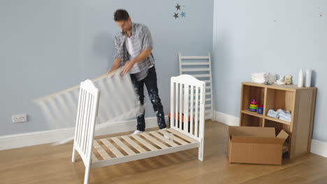 time lapse sequence of couple preparing nursery for baby