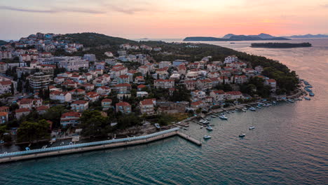 rising aerial hyperlapse of boats sailing through the adriatic sea off the coast of dubrovnik, croatia