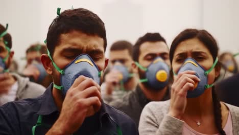 demonstrators wearing protective masks unite amidst haze, highlighting air quality concerns and environmental awareness in a collective stand for change