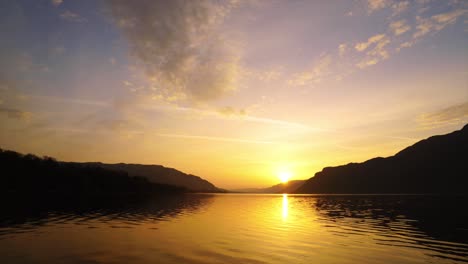 Sun-rising-time-lapse-over-a-mountain-in-Wall-Holm-in-The-Lake-District,-Cumbria