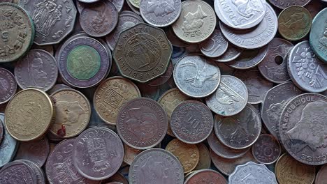 pile world coins from different countries