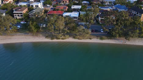 blue green waters of tallebudgera creek with waterfront houses in gold coast, qld, australia