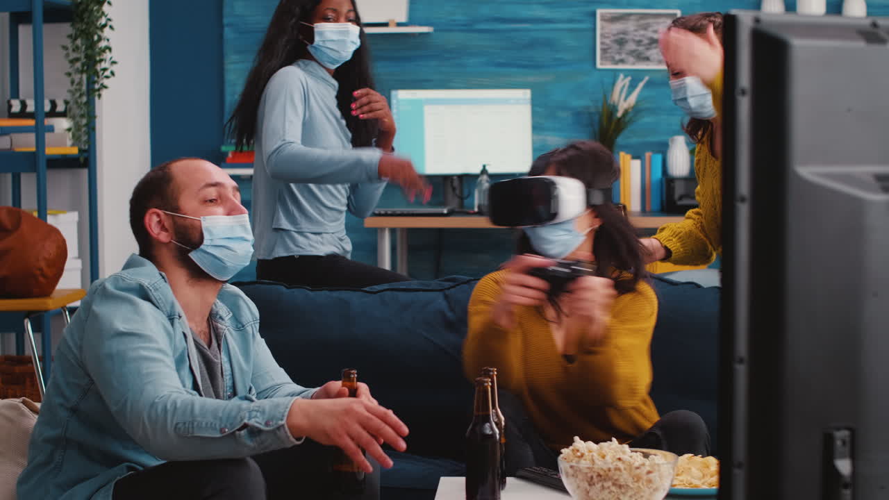 Friends experiencing virtual reality playing video game wearing vr