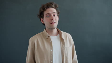 man expressing questioning or confused emotion