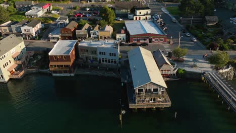 aerial shot of the coupeville downtown historic waterfront during a warm sunset