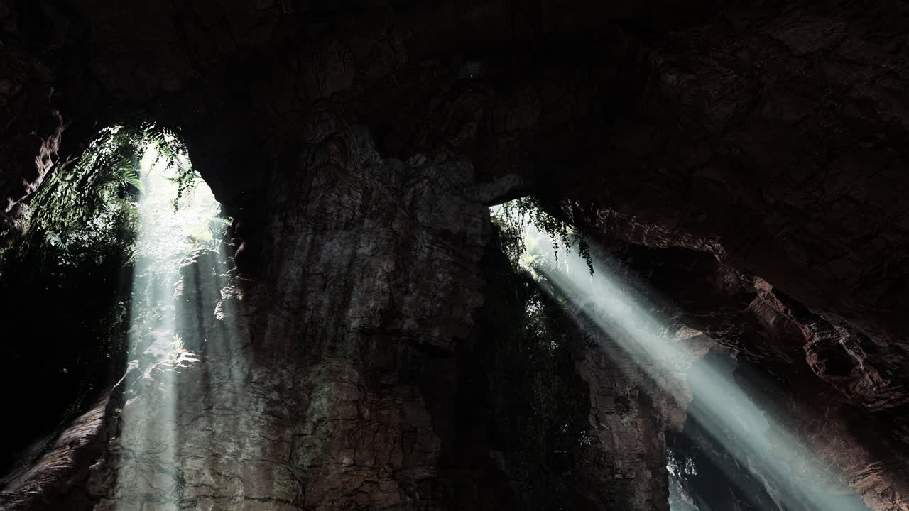 los rayos de sol brillando a través de la entrada de la cueva
