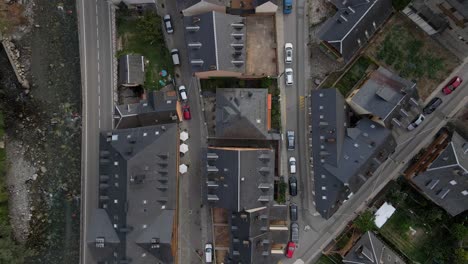 a mesmerizing drone shot captures a top-down view of a beautiful spanish town nestled within the pyrenees mountains