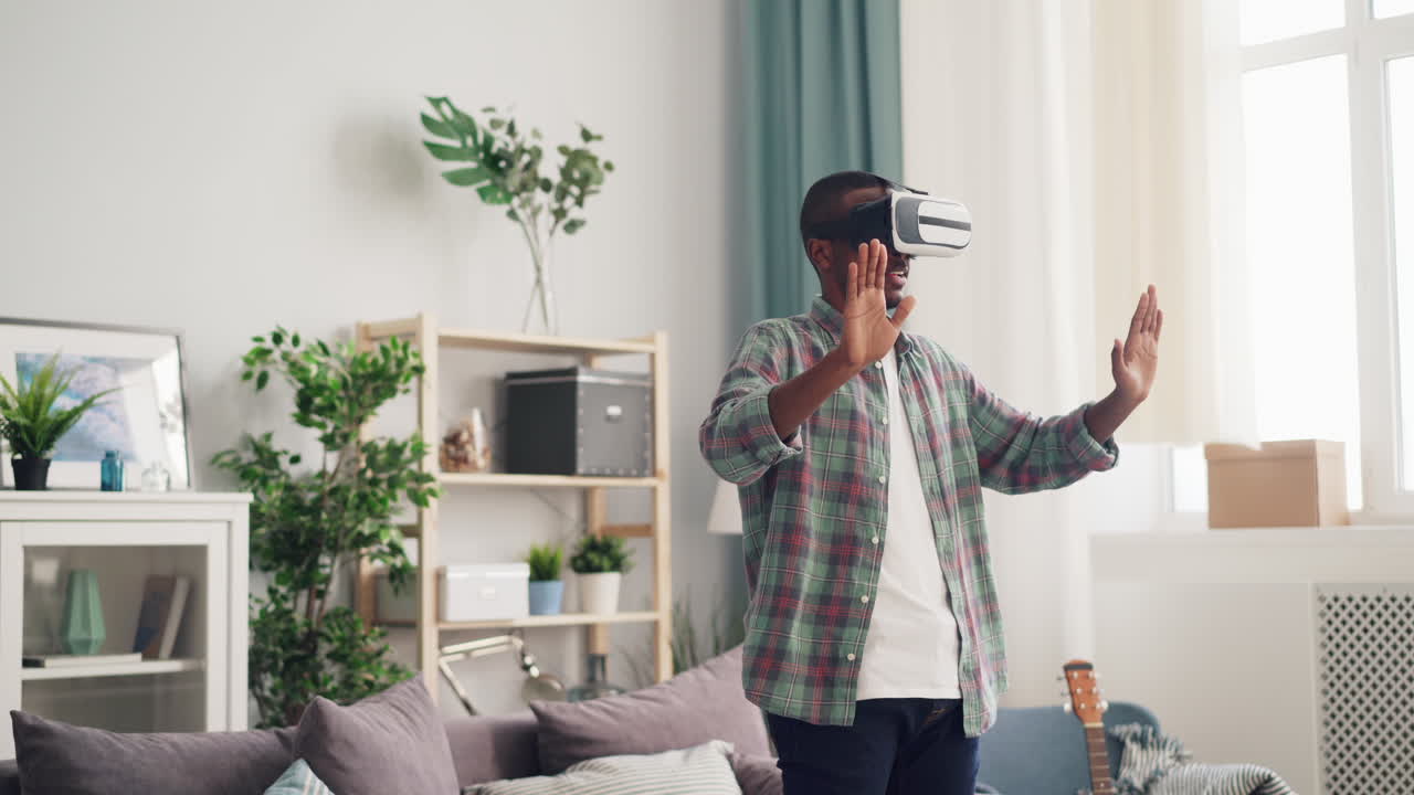 Man Experiencing Virtual Reality in Living Room