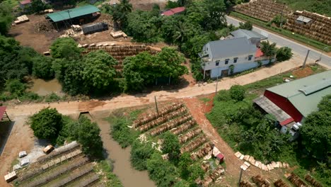 aerial view of a wood processing facility and surrounding rural area