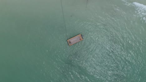 Rising-shot-over-an-empty-boat-in-the-ocean