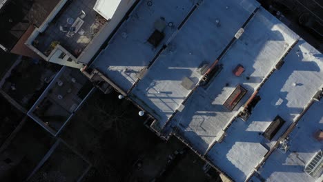 aerial-close-downward-shot-over-the-rooftops-of-Harlem-New-York-City-in-the-am