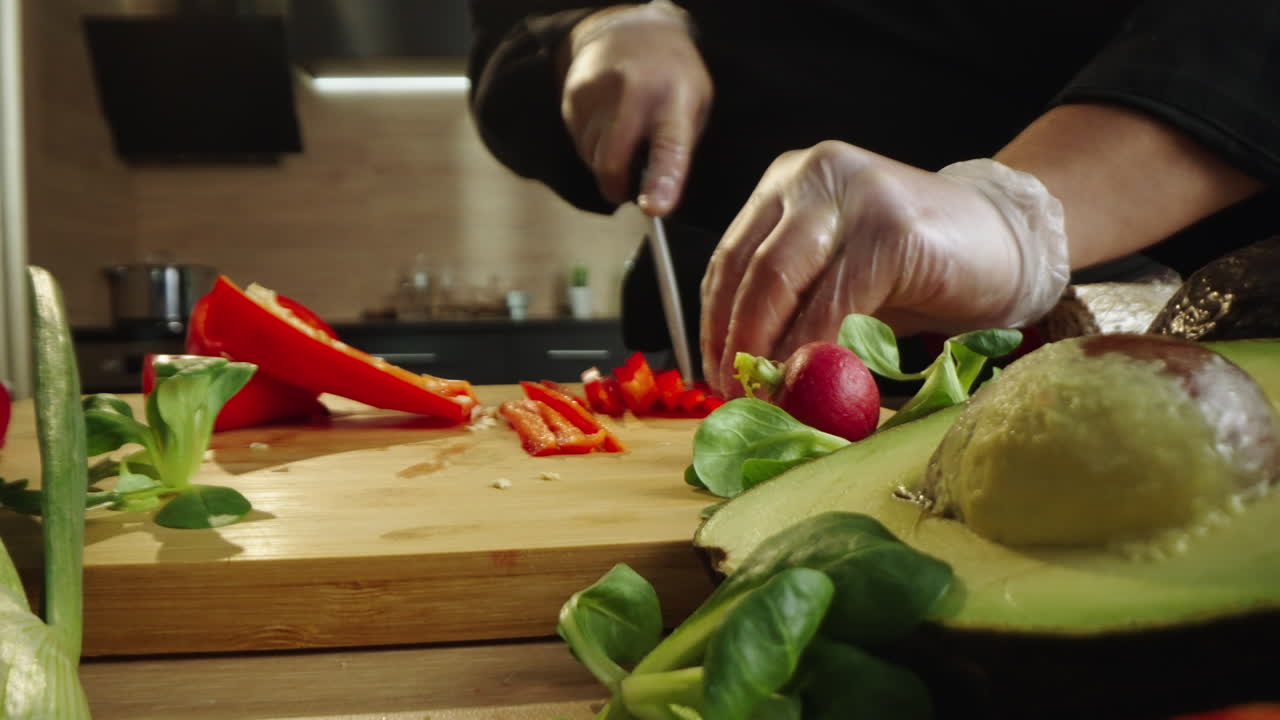 Chef Chopping Vegetables and Fruits for a Healthy Meal