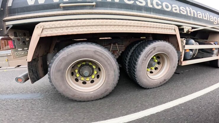 Truck travels on road in Birmingham, England