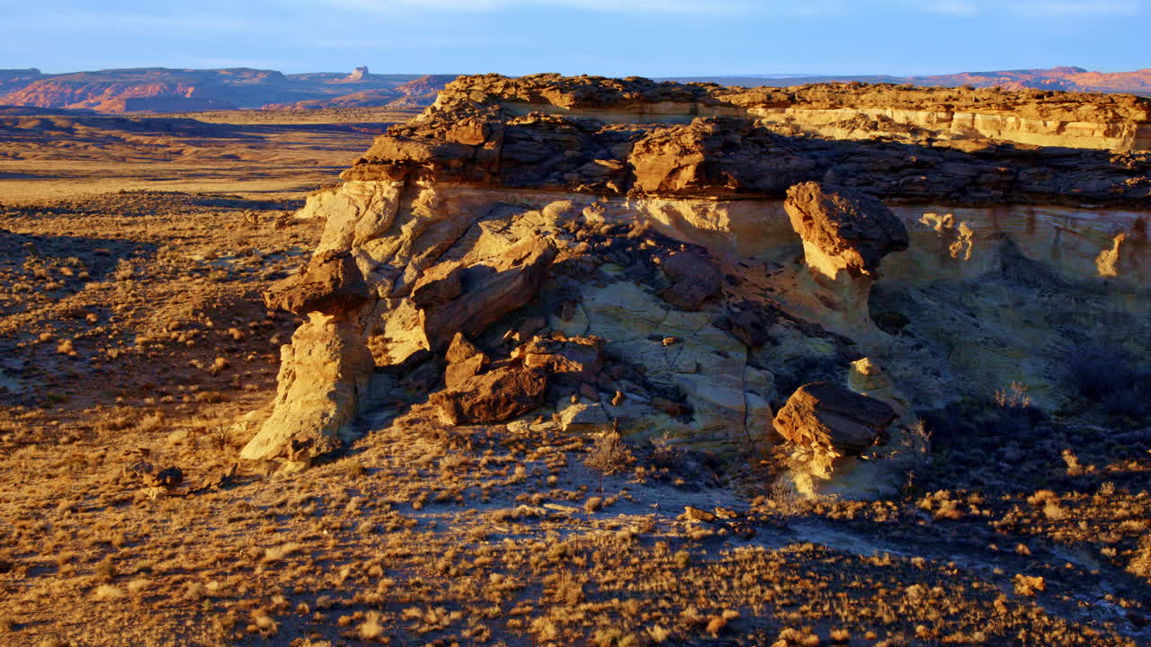 Capturing a drone’s approach to unique rock structures by Lake Powell in Page, Arizona.