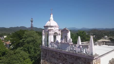 Small-historic-church-of-Chapel-Our-Lady-of-Guadalupe-in-Cosala,-Mexico---aerial