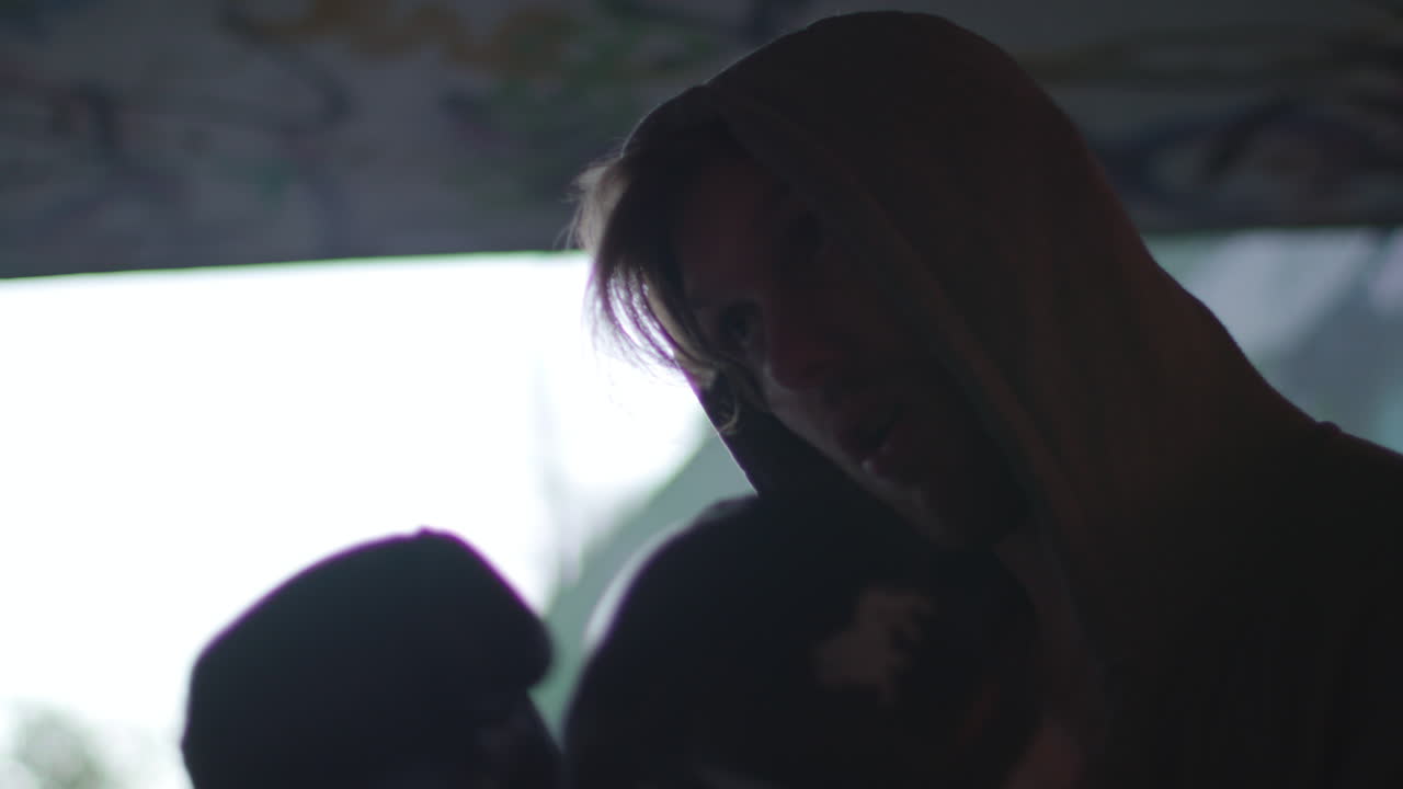 Boxer in Hoodie Training Outdoors