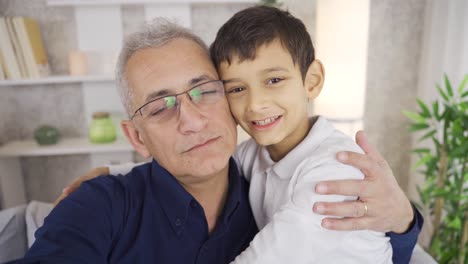 portrait of happy father and son. selfie, father and son taking photo.