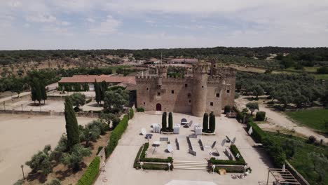 aerial view of palatial castle of arguijuelas de abajo located near caceres