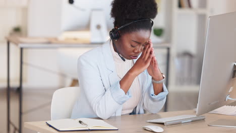 stressed call centre agent talking to customer