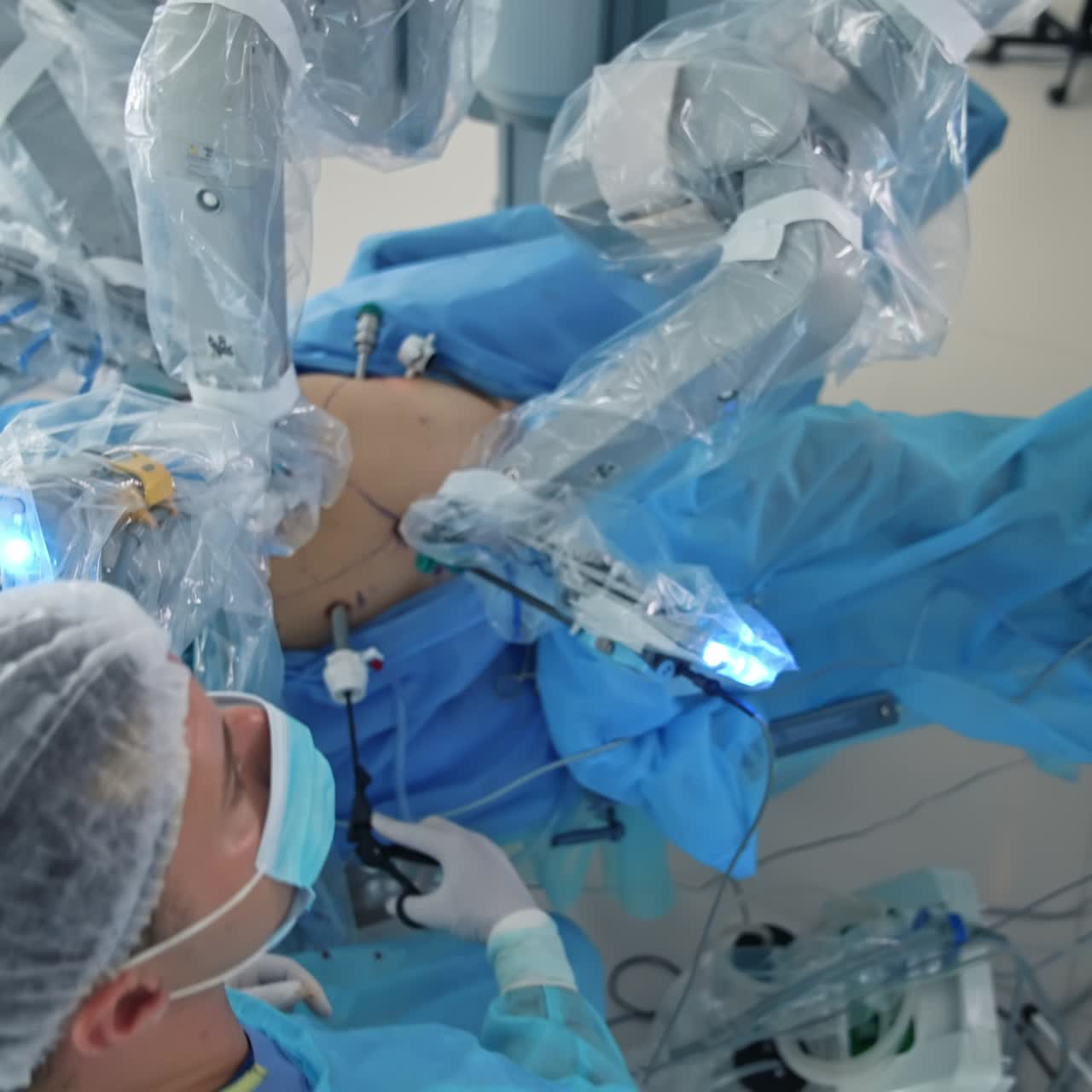 Surgeons in masks working in hospital. Professional medical equipment for surgery treatment