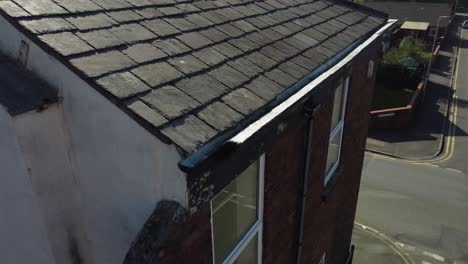 roofing inspection aerial view inspecting damage and repair of real estate for homeowner