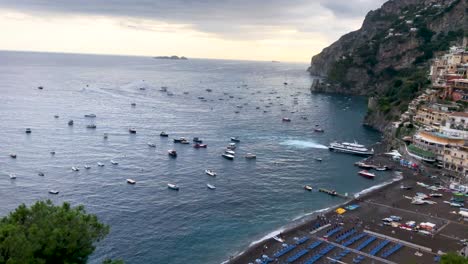 Looking-down-at-sunset-on-Amalfi-Coast-at-Spiaggia-Grande-beach-in-Positano-Italy