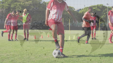 youth soccer players practicing on field with world map animation overlay