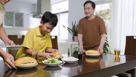 asian men and boy in the kitchen