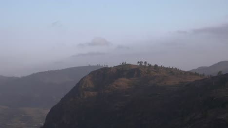 timelaps of the mountain during sunset and the light of the sun is fading