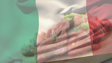 garnishing raw meat with herbs, italian flag colors in background