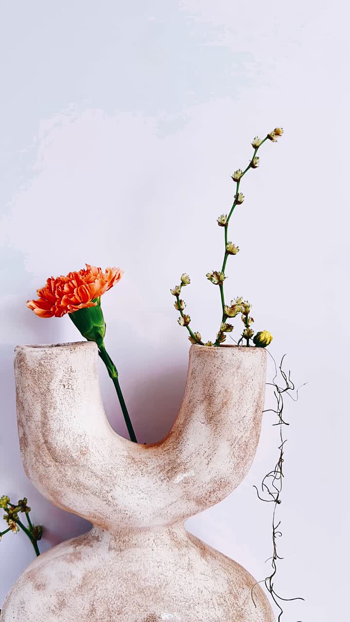 Modern Floral Arrangement in Abstract Vase