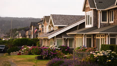 slow motion shot of seafront apartments overlooking canon beach, oregon