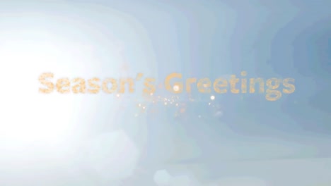 seasons greeting text over fireworks exploding against gradient blue background