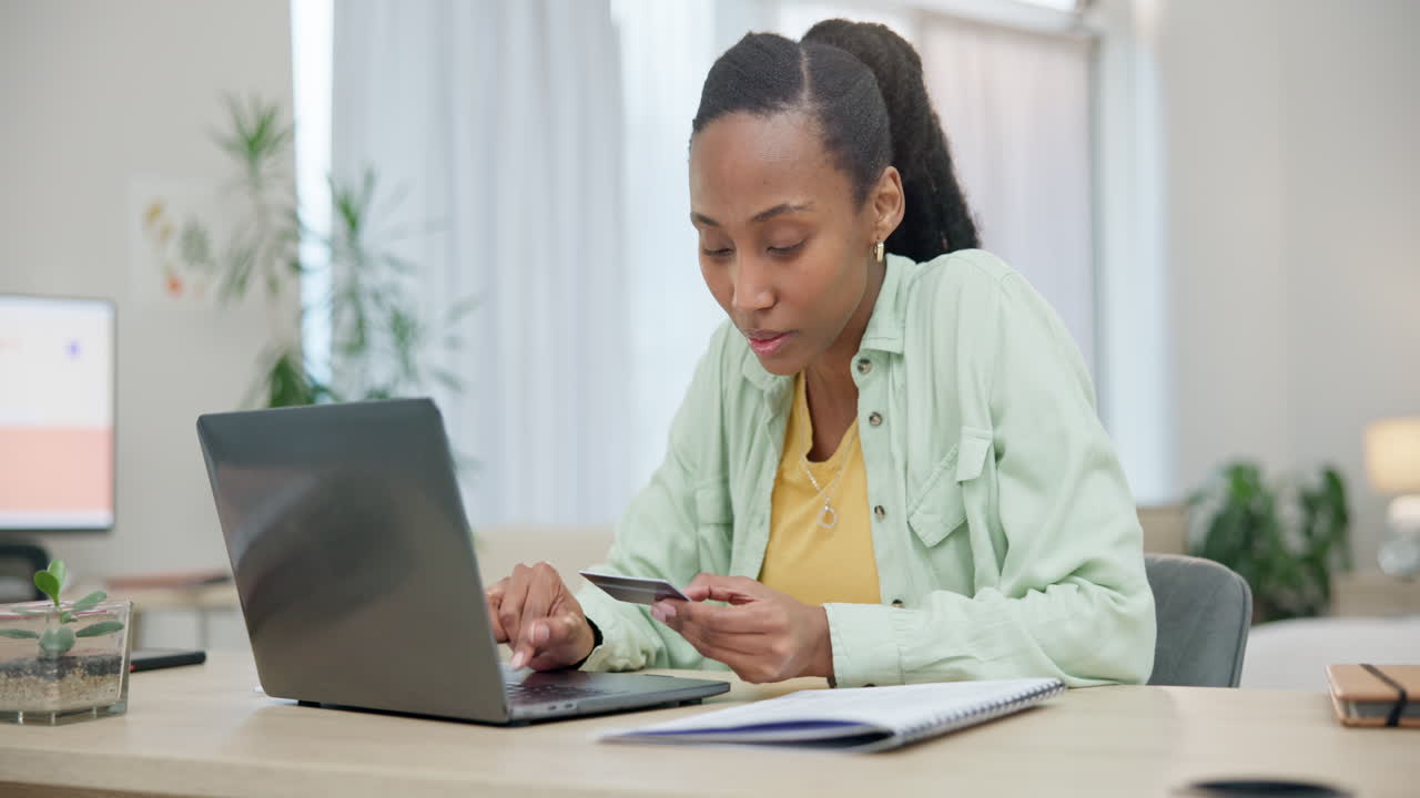 Black woman, laptop and credit card