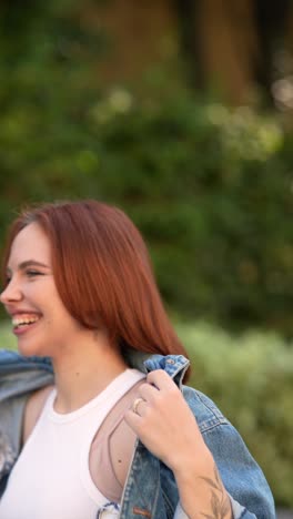 woman with red hair outdoors