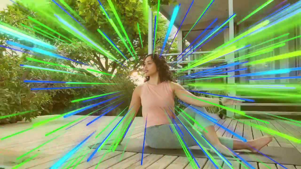 Vertical video: Woman doing twist on mat with cam zooming and radial glowing around her for fitness