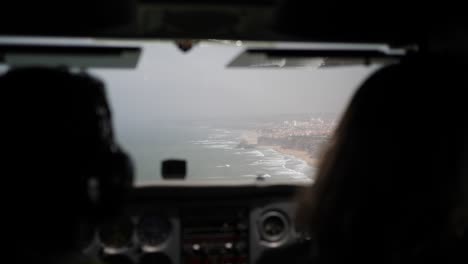 flying the coast of portugal on a plane