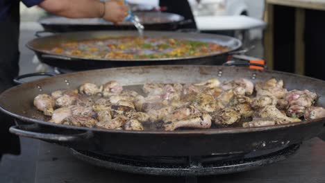 Slow-motion-shot-of-a-variety-of-foods-being-cooked-for-a-wine-tasting-event