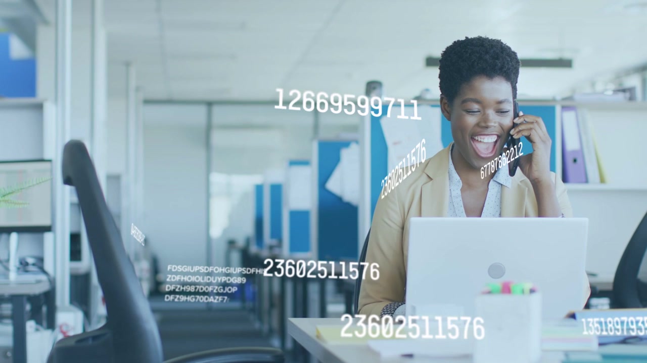 Woman taking phone call, typing on laptop and checking data, causing rotating data overlays in tech