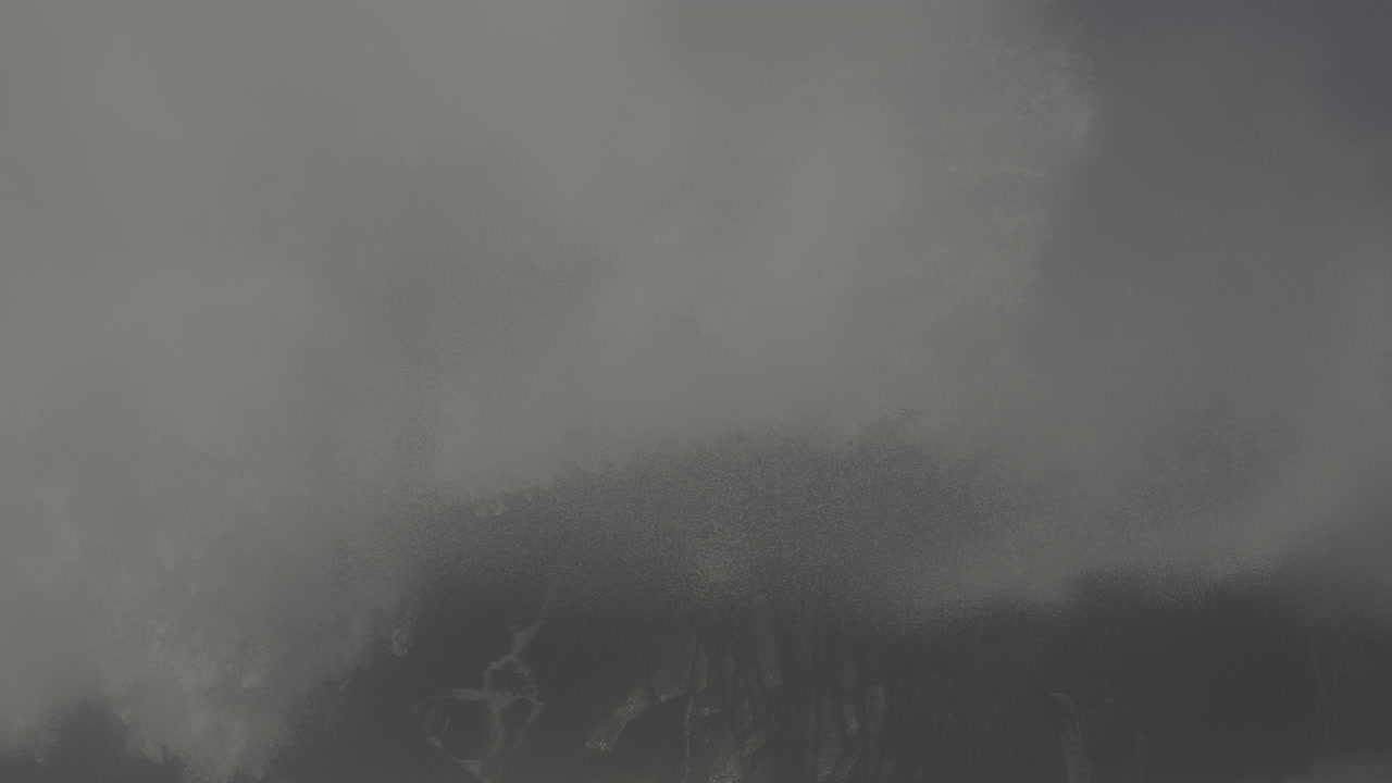 Powerful Waves Crashing on Rocky Coastline