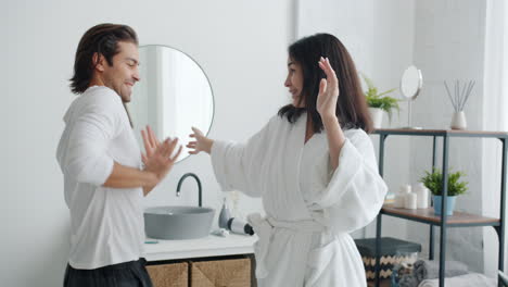 couple dancing in bathroom