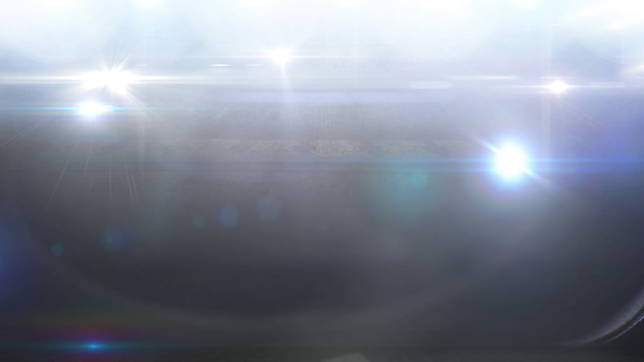 홍수 조명 스포츠 경기장에서 흐릿한 움직이는 불빛과 보케 빛 반점의 애니메이션