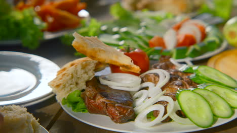 grilled meat with vegetables and bread