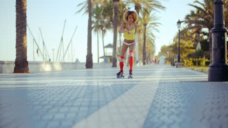 sexy roller girl skating on exotic promenade