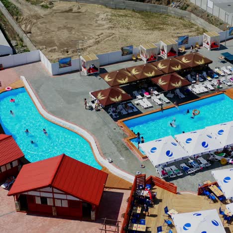 people relaxing in swimming pool